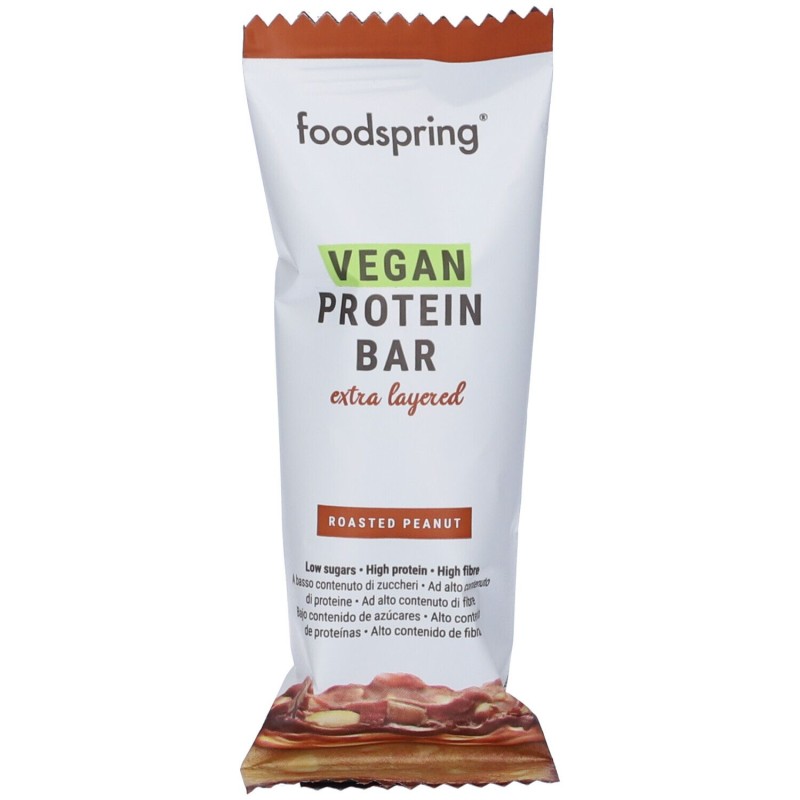 Primo piano di Foodspring Barretta Proteica Vegana Multistrato Gusto Arachidi 1 Pezzo Primo piano di Foodspring Barretta Proteica Vegana Multistrato Gusto Arachidi 1 Pezzo